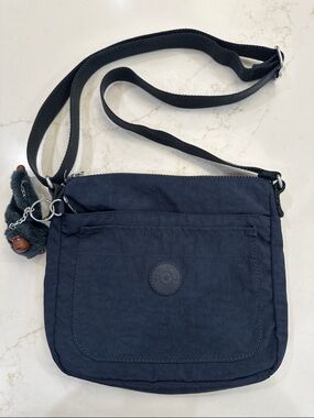 Kipling Sebastian Navy Crossbody with Monkey Key Charm
